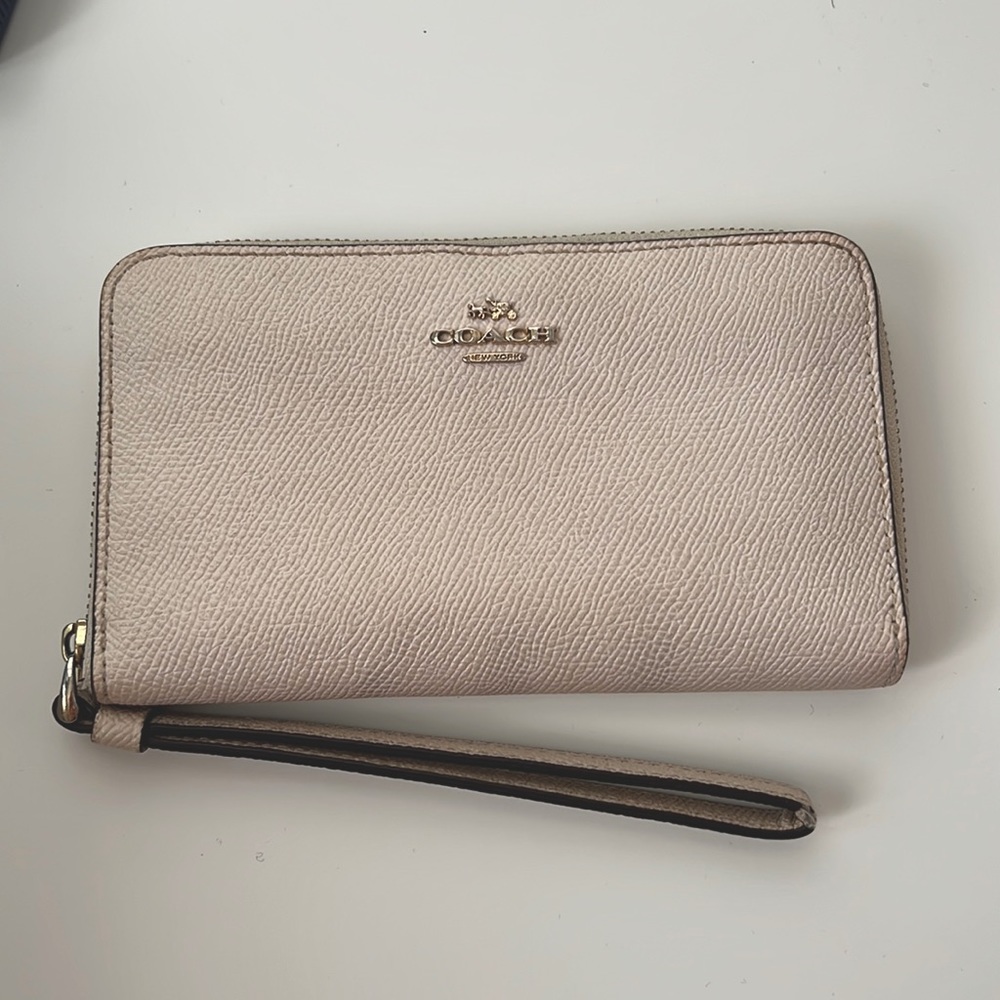 Coach beige wallet with wrist strap